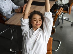 medium-shot-woman-stretching-work