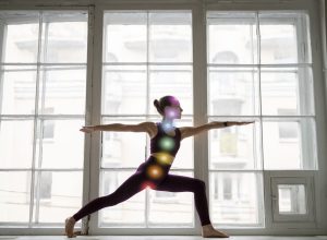 young-woman-meditating-with-chakras-her-body (1)